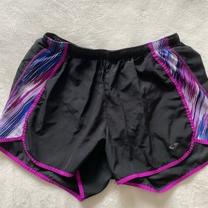 Athletic shorts with purple accents